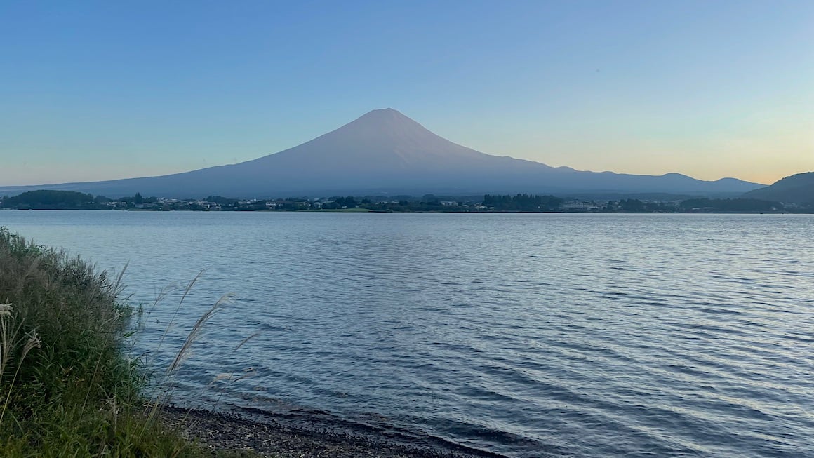 Mount fuji standing proudly over Lake Kawaguchiko, Japan.