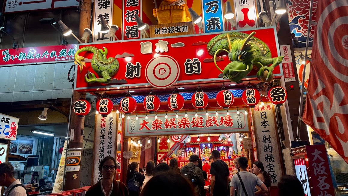 A vibrant street food stall in Osaka, Japan.