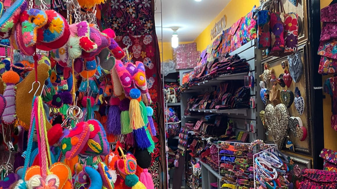 a souvenir shop in the heart of mexico city full of colorful mexico souvenirs