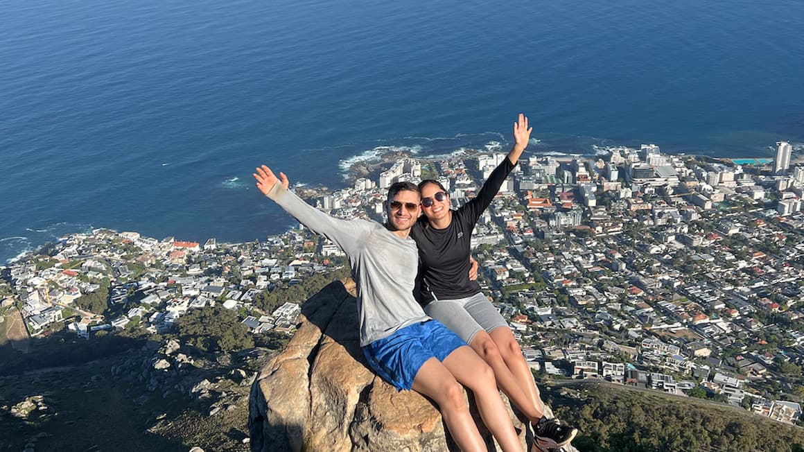 two friends hiking to a viewpoint in cape town, South Africa 