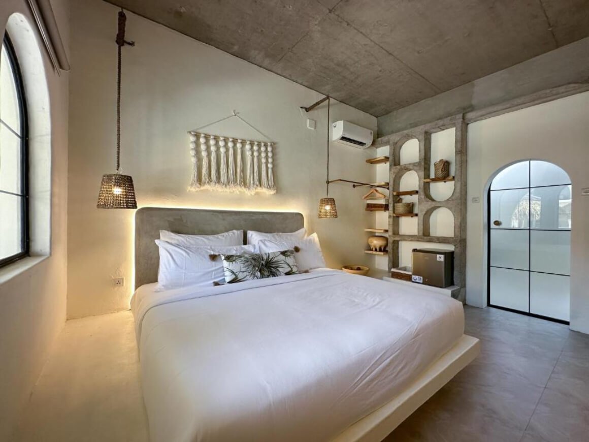 Scandinavian-style bedroom in El Tropico Boutique Hotel