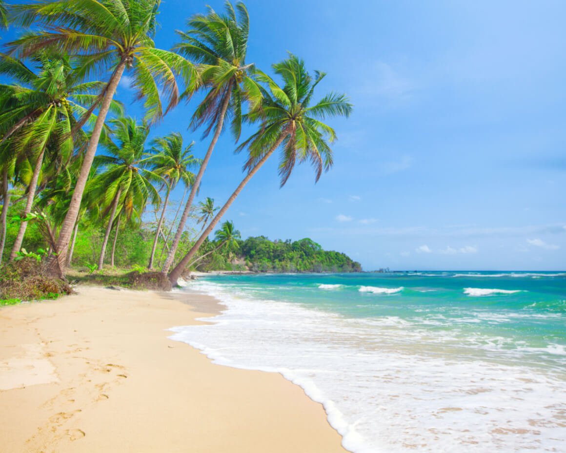 Langub Beach in Malapascua with turquoise water, white sand, and palm trees