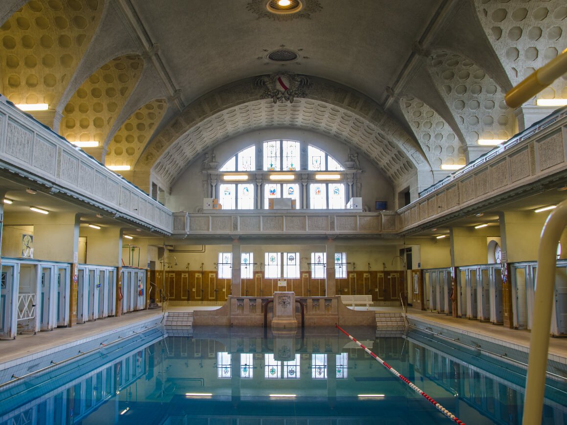 Municipal Baths in Strasbourg France with stained glass and ornate details.