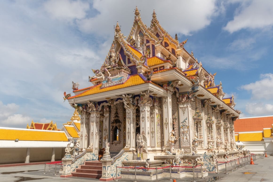 Wat Pariwat under a vivid blue sky 
