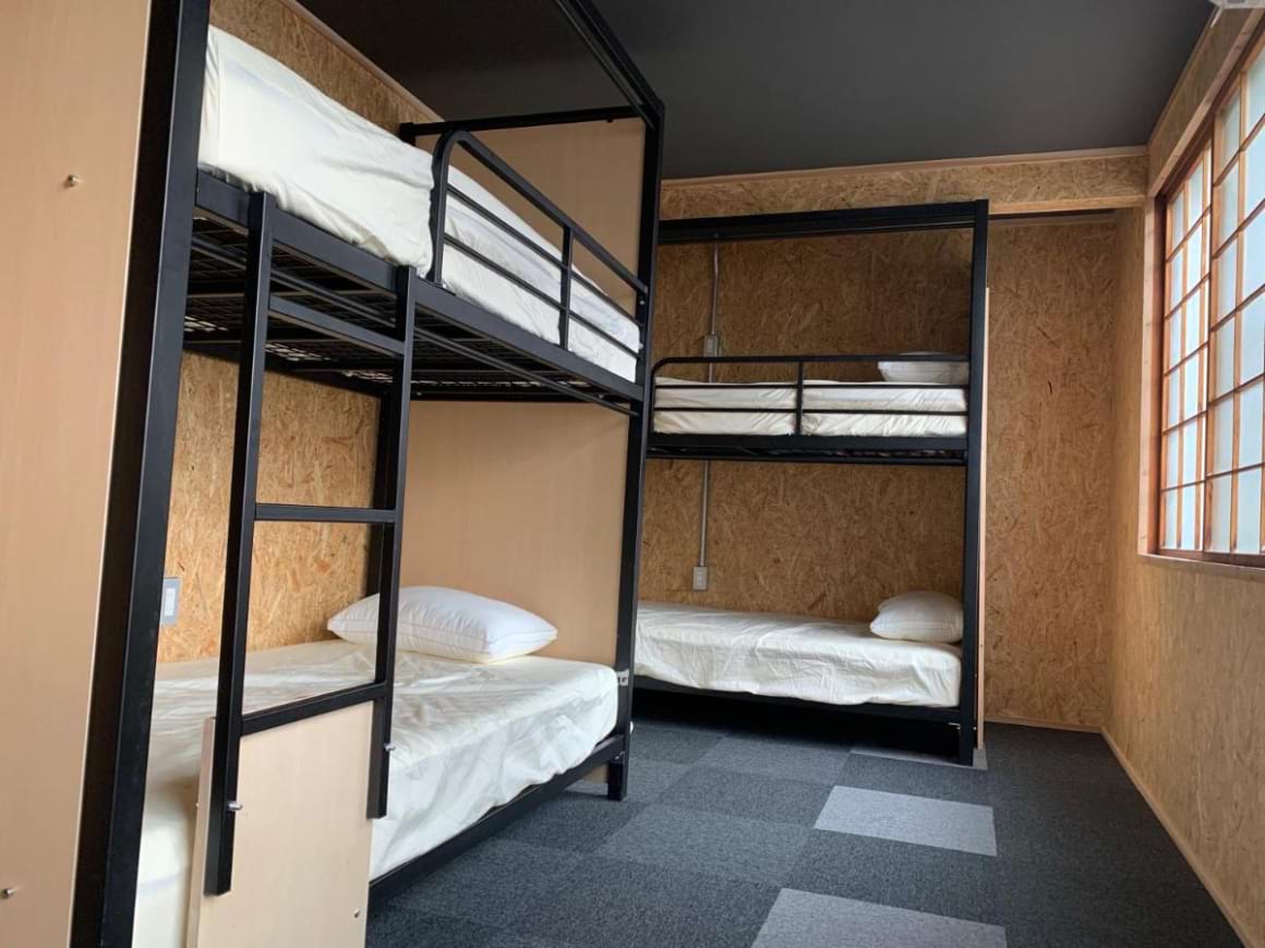 A dorm room with 2 bunk beds in Arura Sapporo