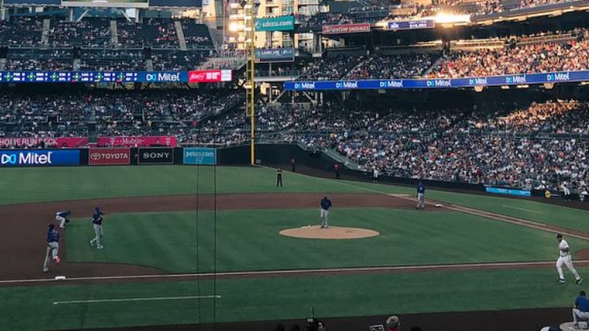 petco park, baseball field with a large and very full stadium in san diego.