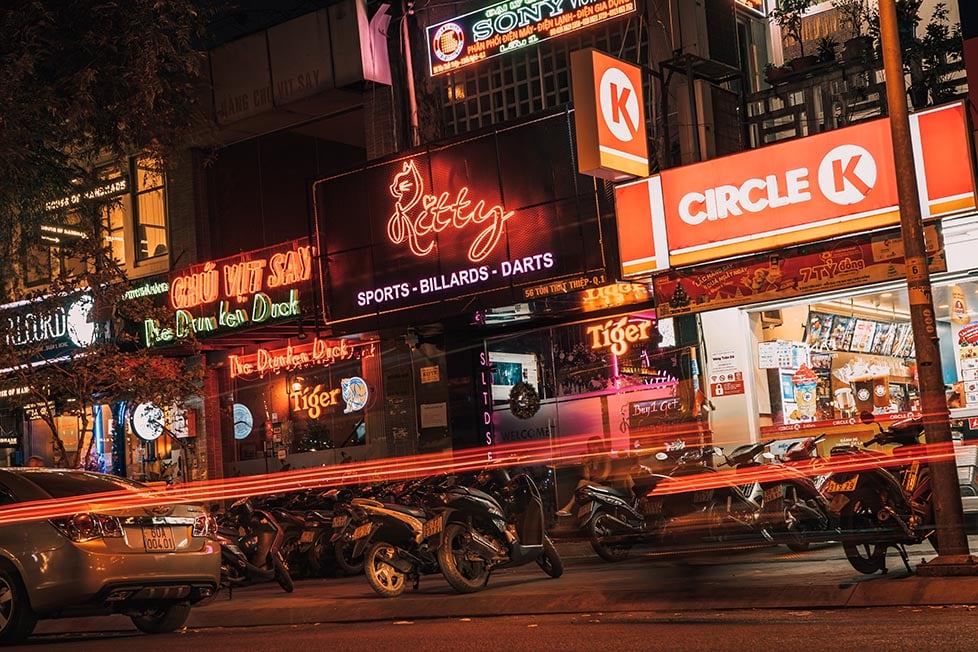 Busy streets and circle K in Ho Chi Minh, Vietnam