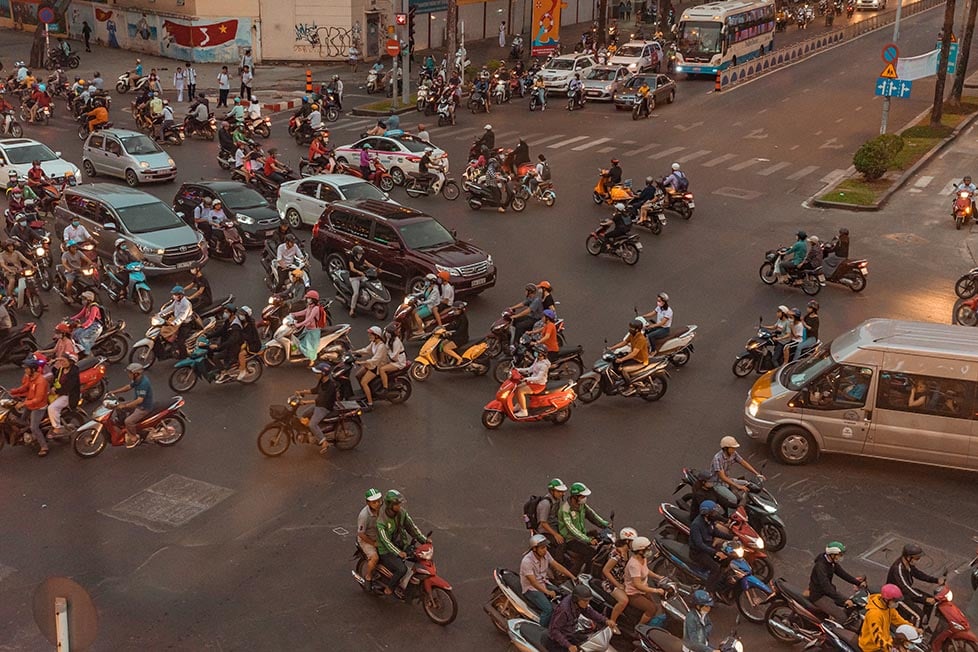 A busy street full of motorbikes/ scooters in Vietnam