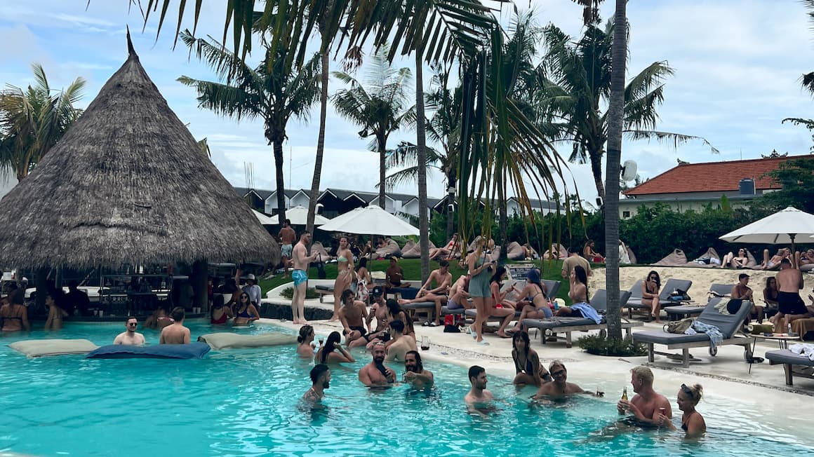 a party at a pool in canggu, bali, indonesia