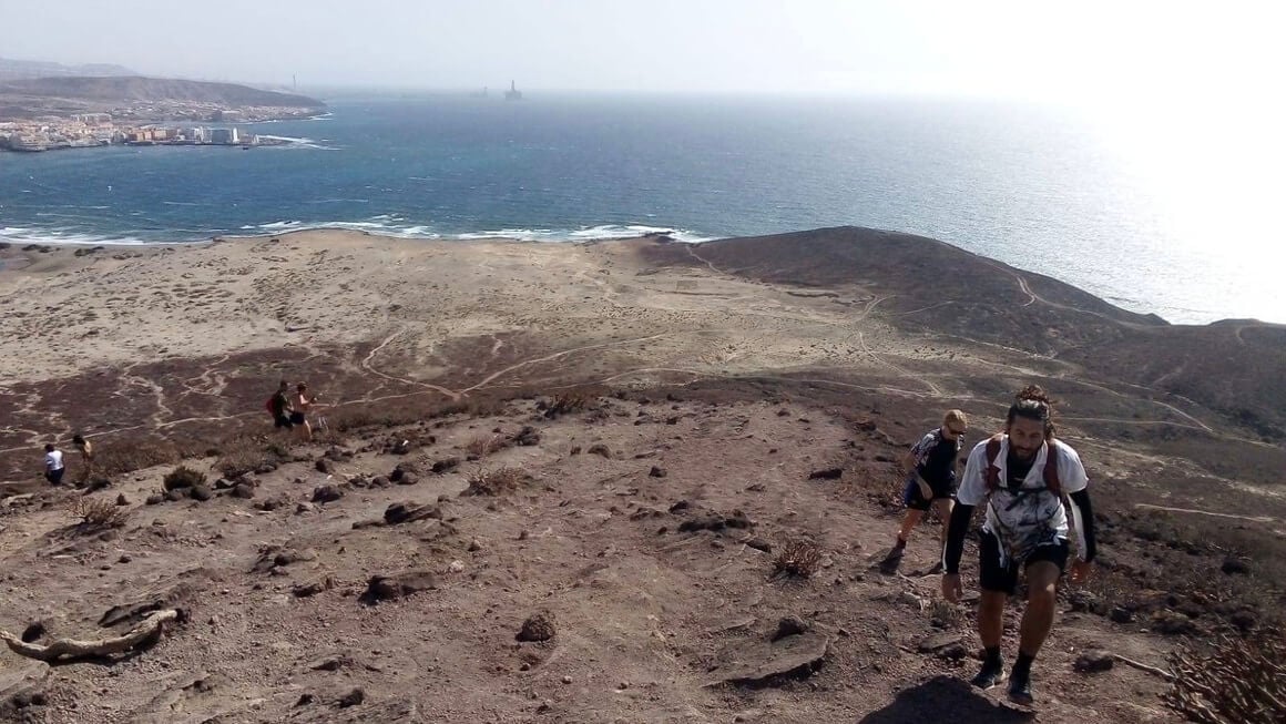 Two people hiking uphill in Tenerife
