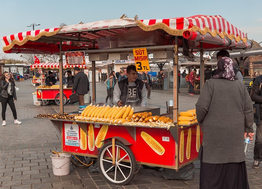 A street vendor selling grilled corn/ street food in Istanbul, Turkey