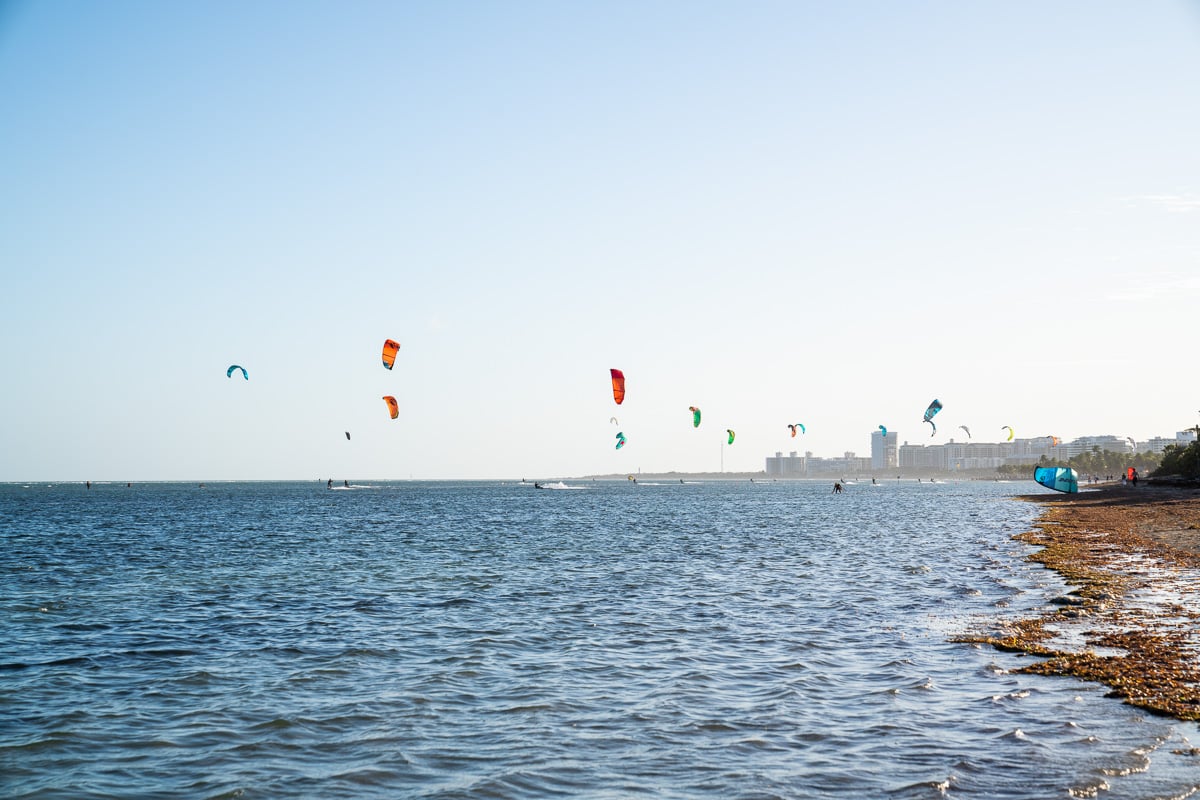 windsurfers flying on the beach on key biscayne in miami florida
