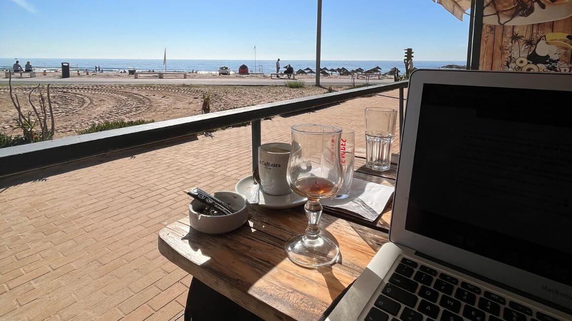 remote work at a beach near lisbon, portugal