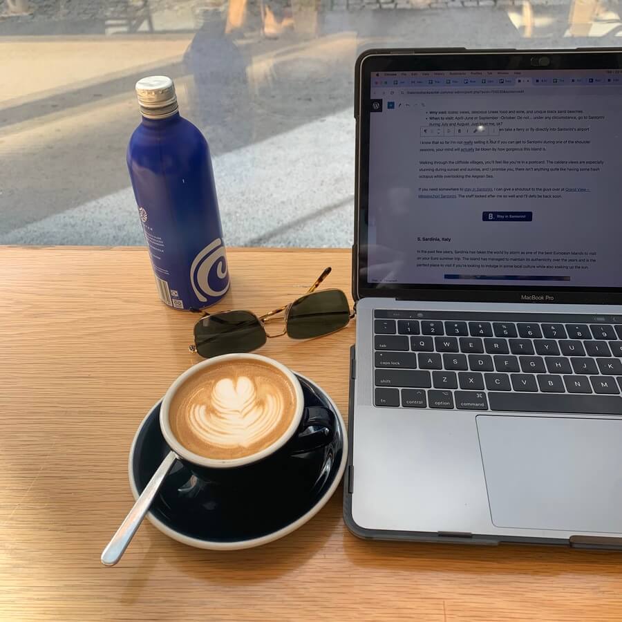 Digital nomad in Portugal. Coffee, laptop and work in Lagos.