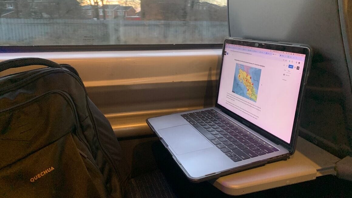 Digital nomad laptop on a train