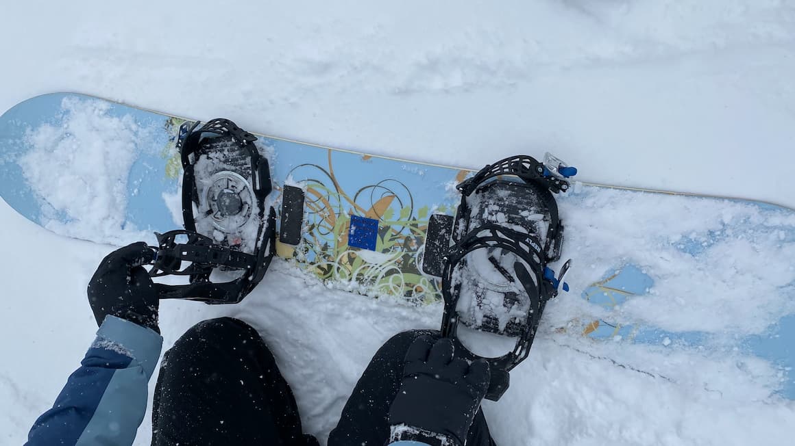 a snowboard in the snowy mountains of park city utah