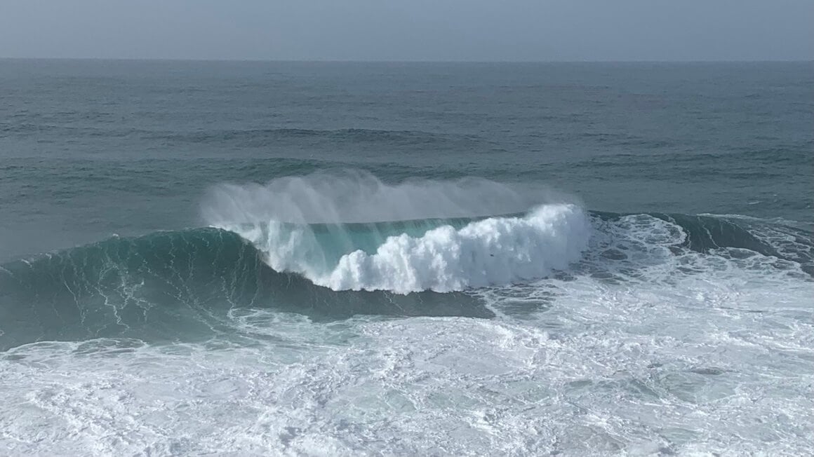 Massive wave in Nazare Portugal surf ocean