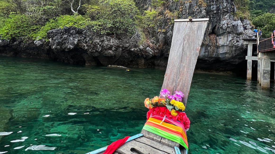 a traditional Thai boat in the ocean of Krabi, Thailand