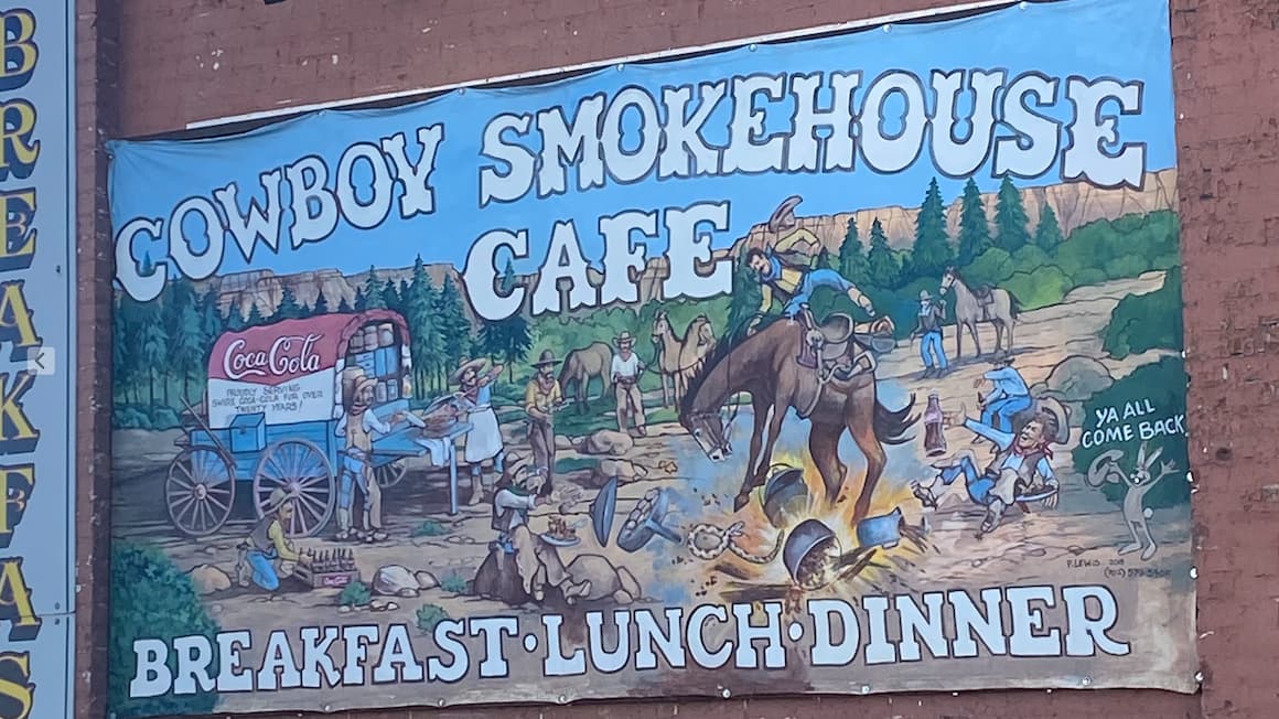 a poster promoting a cowboy diner in park city, utah United States of America.