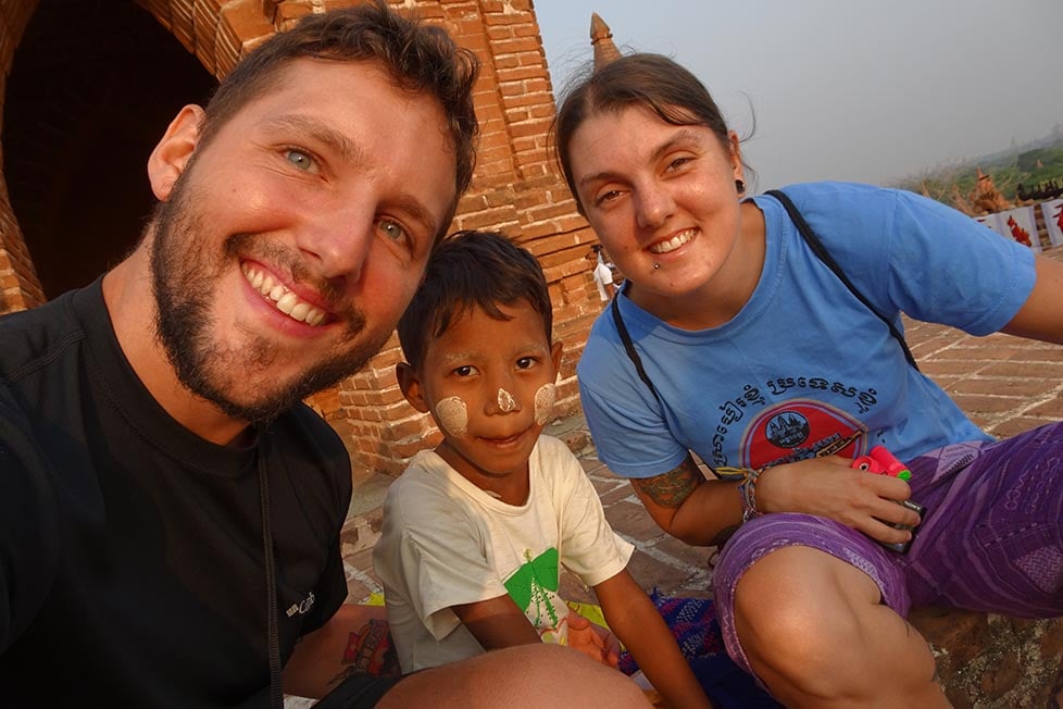 Nic and Shorty playing with a kid in Bagan, Myanmar/ Burma.