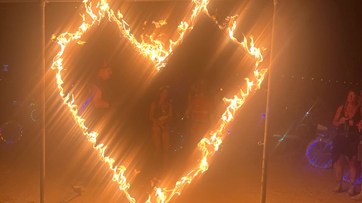 a heart on fire at the burning man festival in nevada, usa