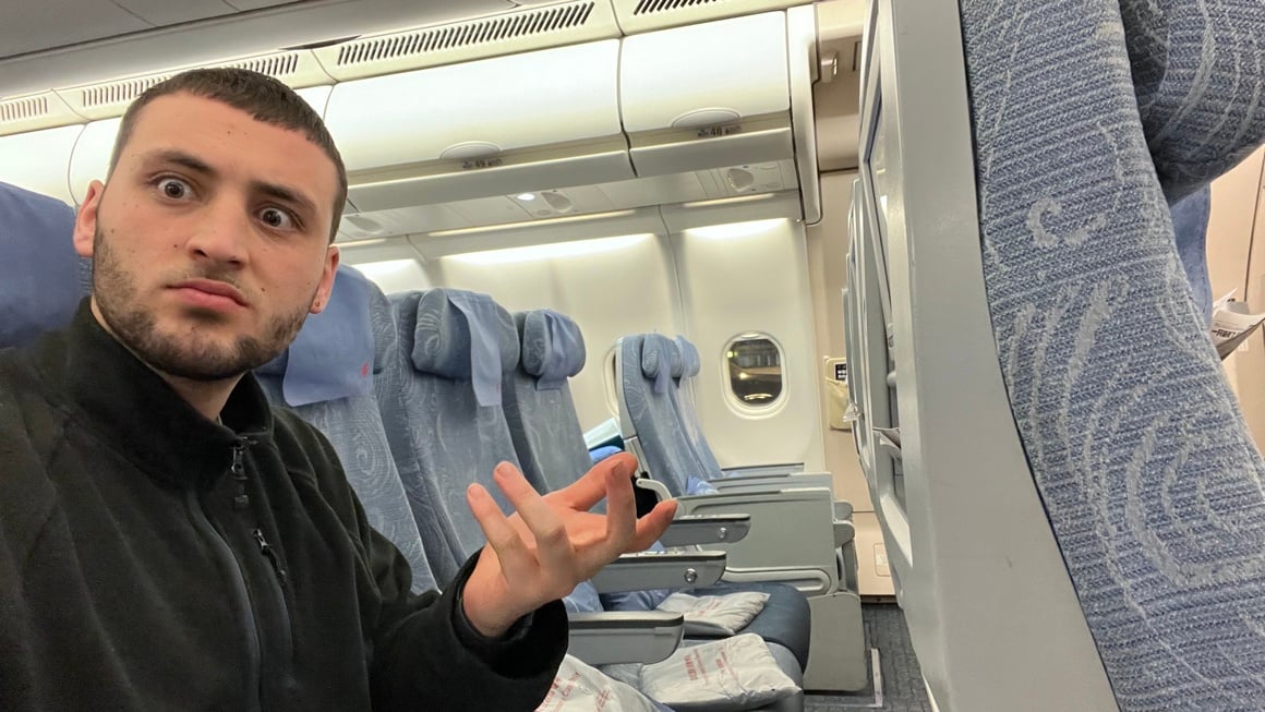 man on empty plane flight