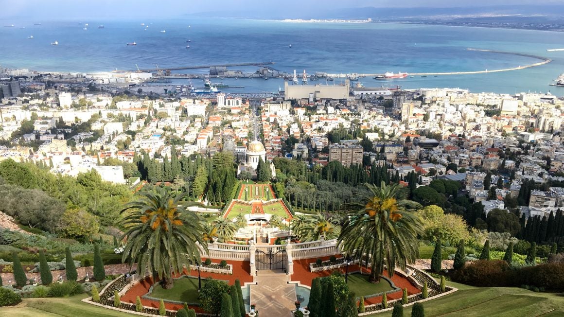 the view from the top of the bahai gardens in haifa, overlooking the sea