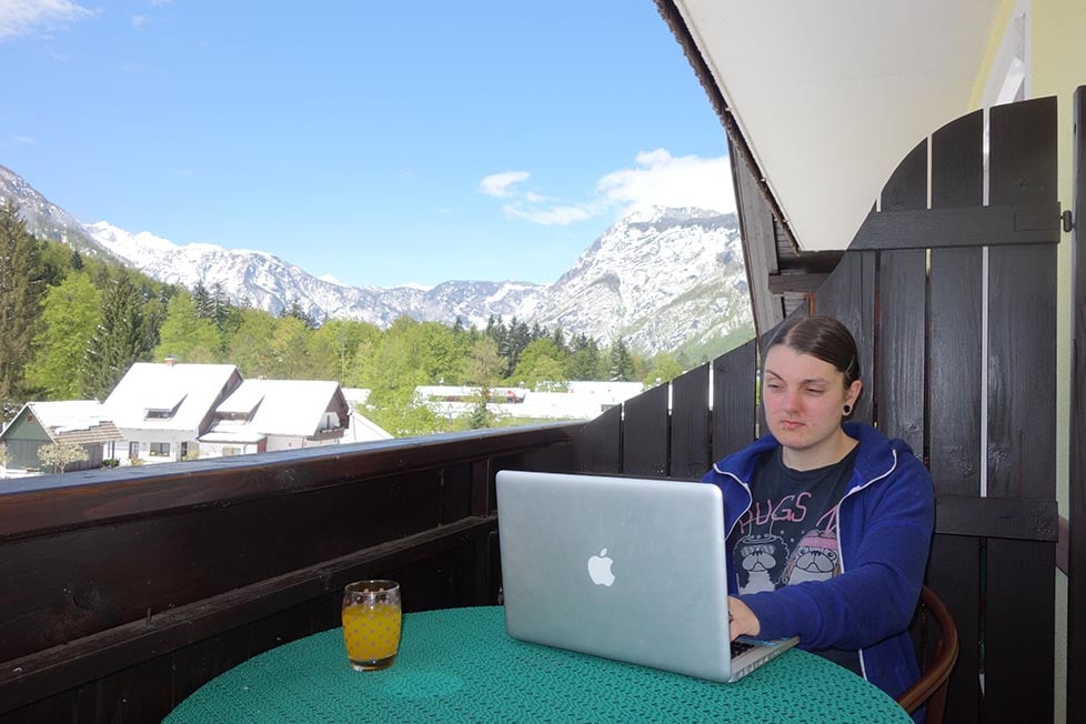 Nic working on a laptop in Bohinj, near Bled in Slovenia.