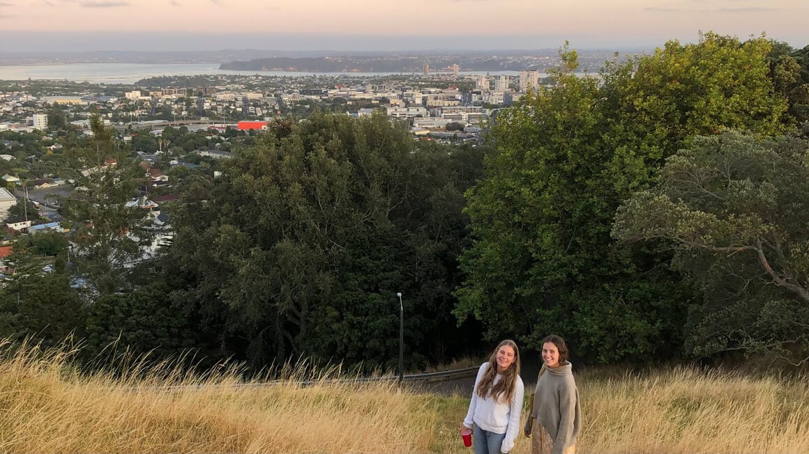 danielle and friend up mount eden in auckland, new zealand