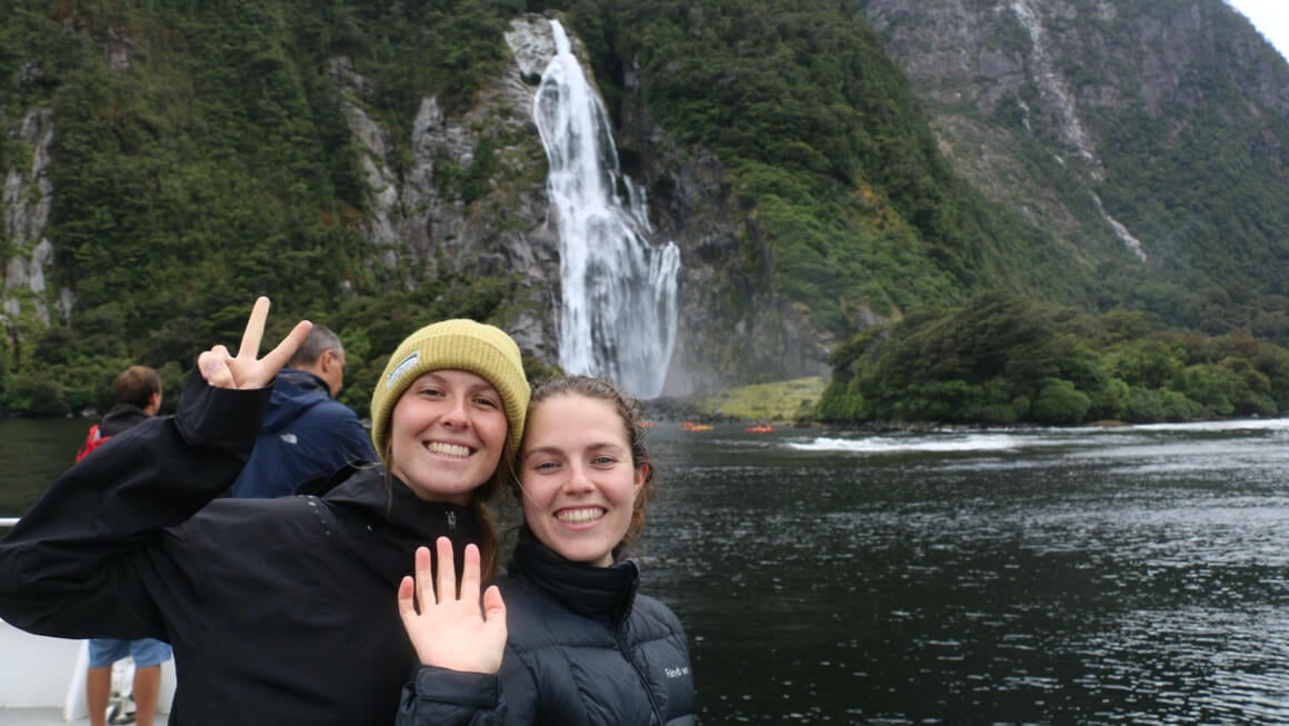 danielle and friend at milford sounds new zealand