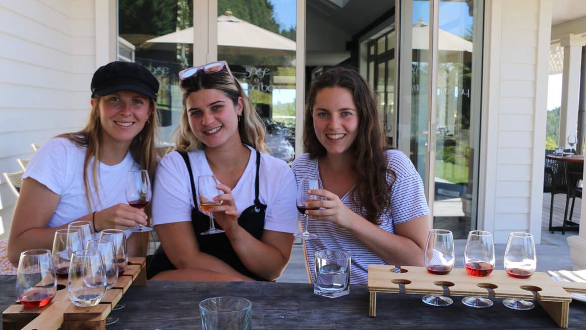 danielle and friends at a winery in new zealand
