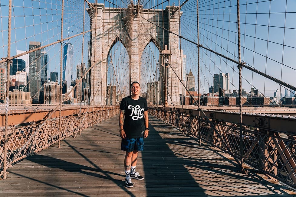 Nic walking across the Brooklyn Bridge, New York, USA