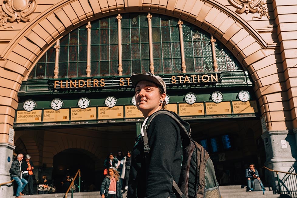 Nic standing under the clocks at Flinders Street Station in Melbourne, Australia. .