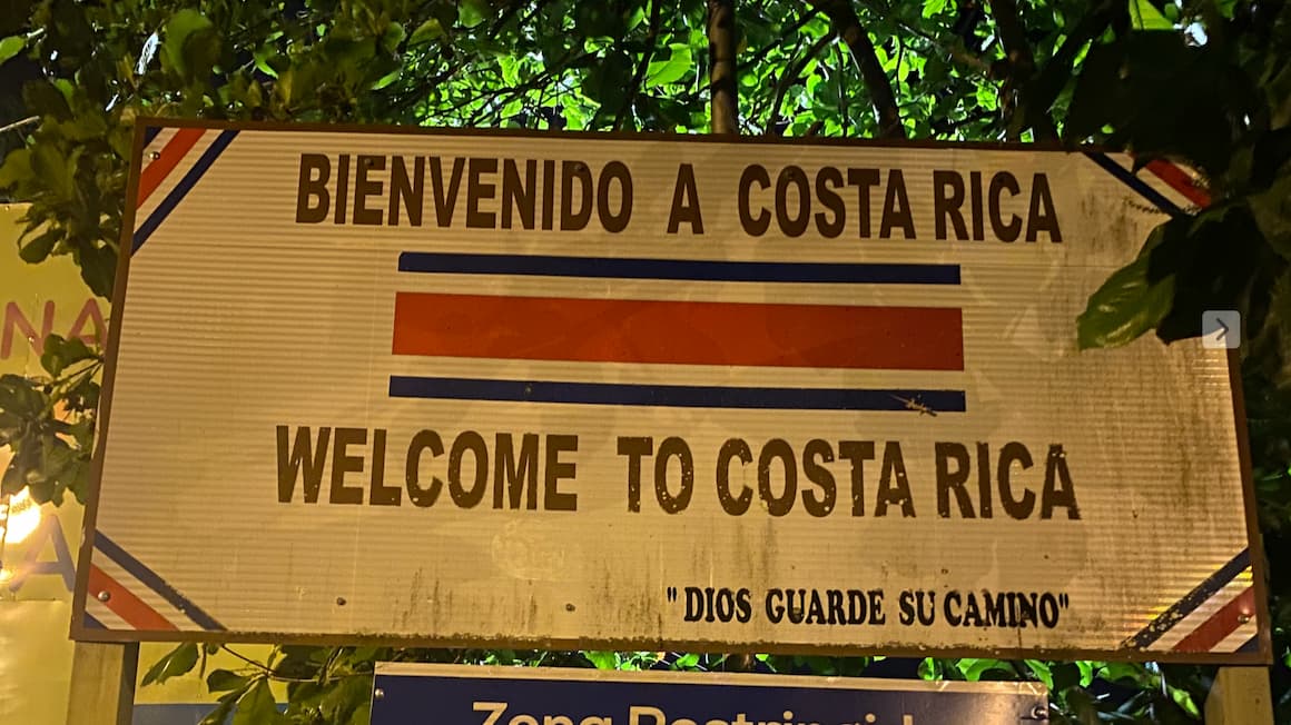 welcome to costa rica sign at the border