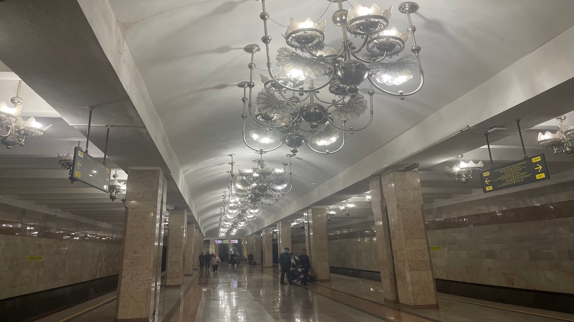 chandeliers on the ceiling of a modern metro station hall in tashkent uzbekistan