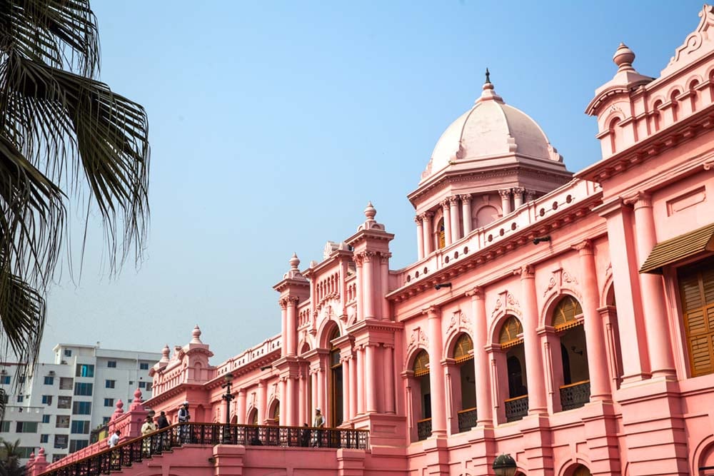 a pink colonial style building in bangladesh