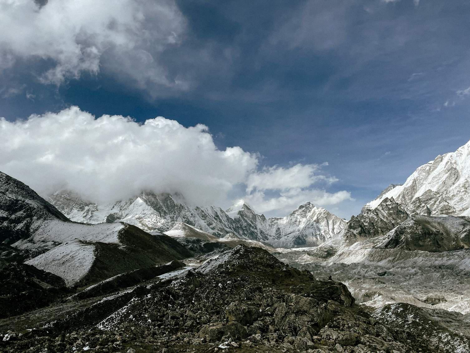 expansive view of snow covered glaciers in the himalayas as seen while trekking to everest base camp in nepal