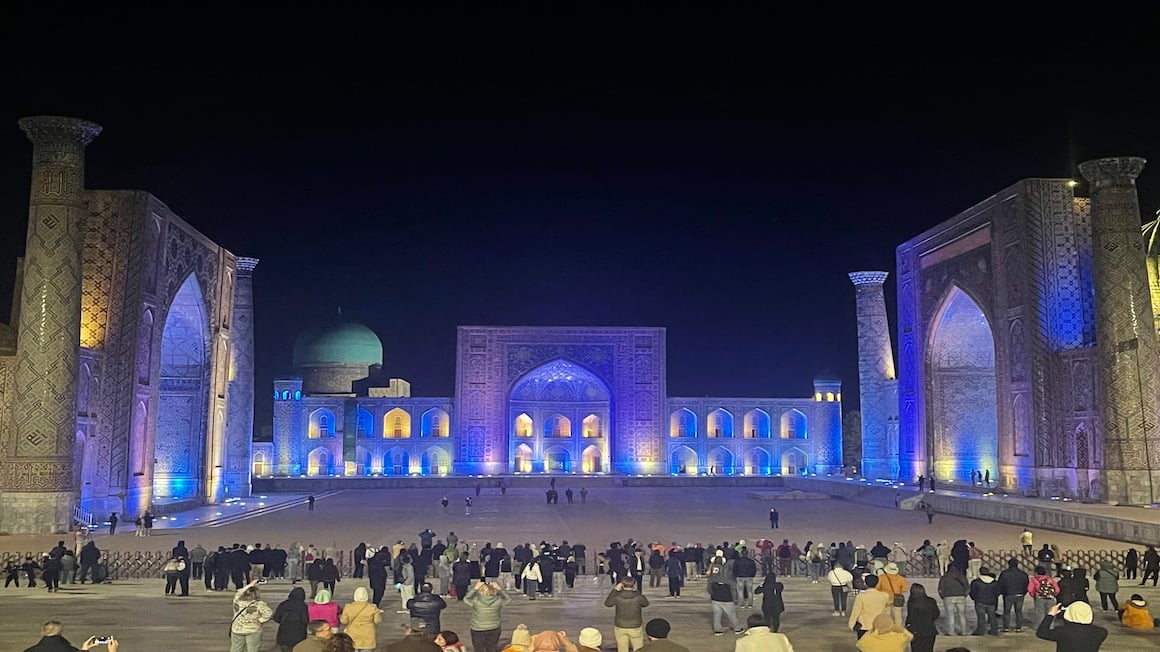 the massive registan in samarkhand uzbekistan lit up at night