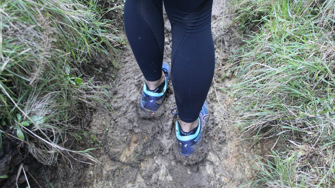 bad hiking shoes in New Zealand getting stuck in the mud