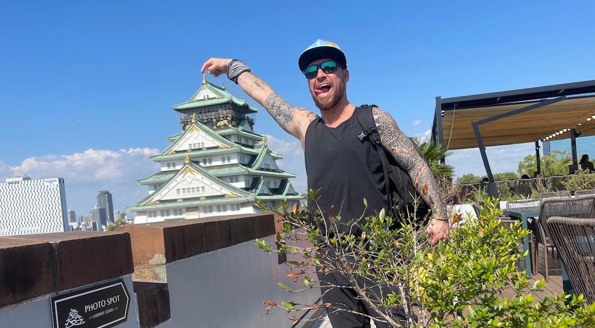 Will standing proudly next to the Osaka Castle in Japan.