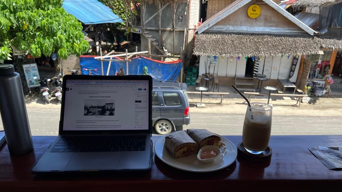Digital nomad in Siargao, Philippines. Laptop and remote work.