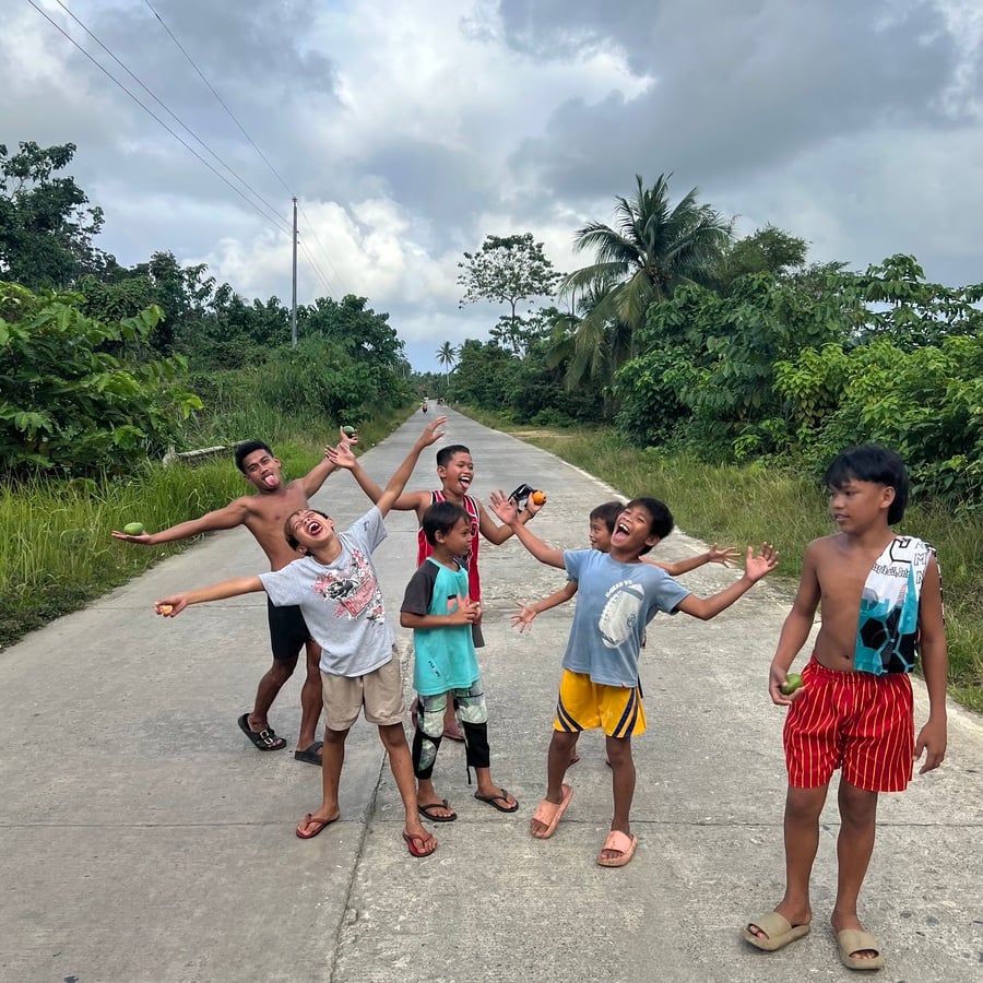 Local kids in Philippines making silly faces