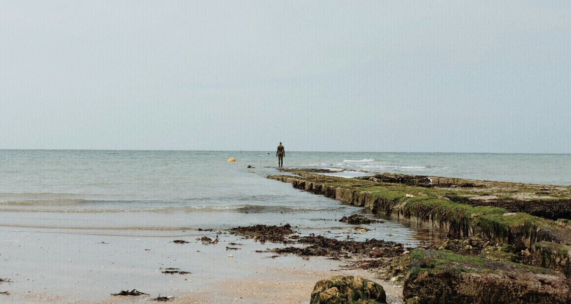 A person standing on a beach Margate UK