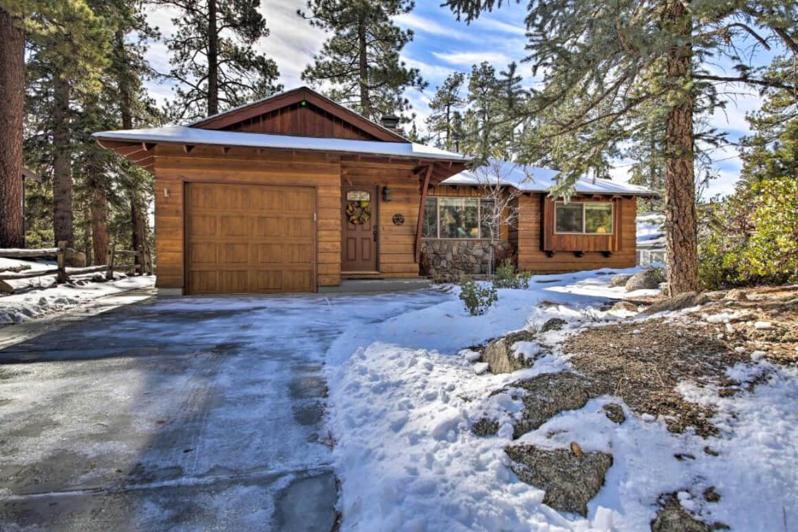 Rustic Fawnskin Lodge, Big Bear CA. Snow on the ground of this rental cabin in the woods