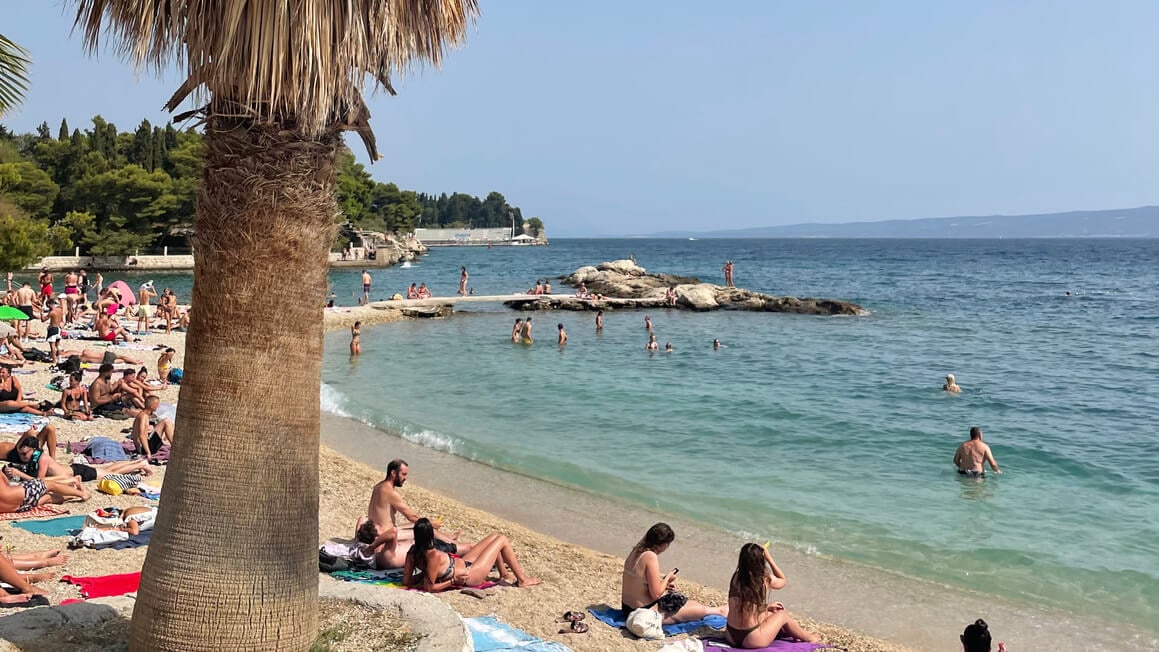 busy beach in split croatia on a sunny day
