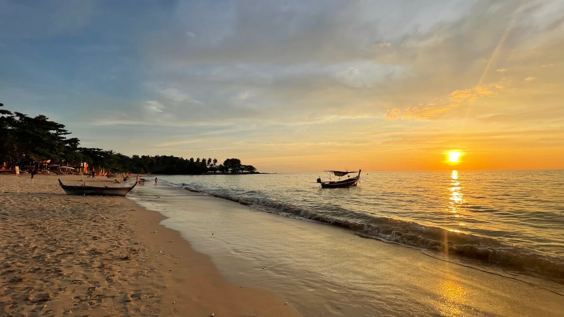 sunset on relax bay on koh lanta, thailand