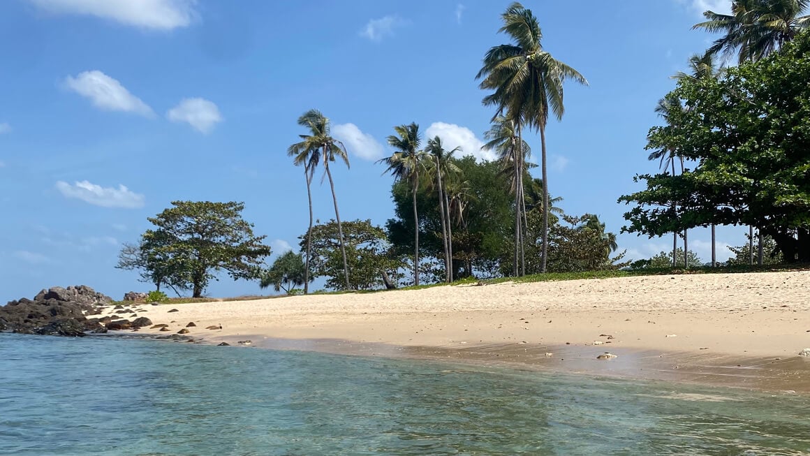 view from the water looking in at secret beach, koh lanta, thailand