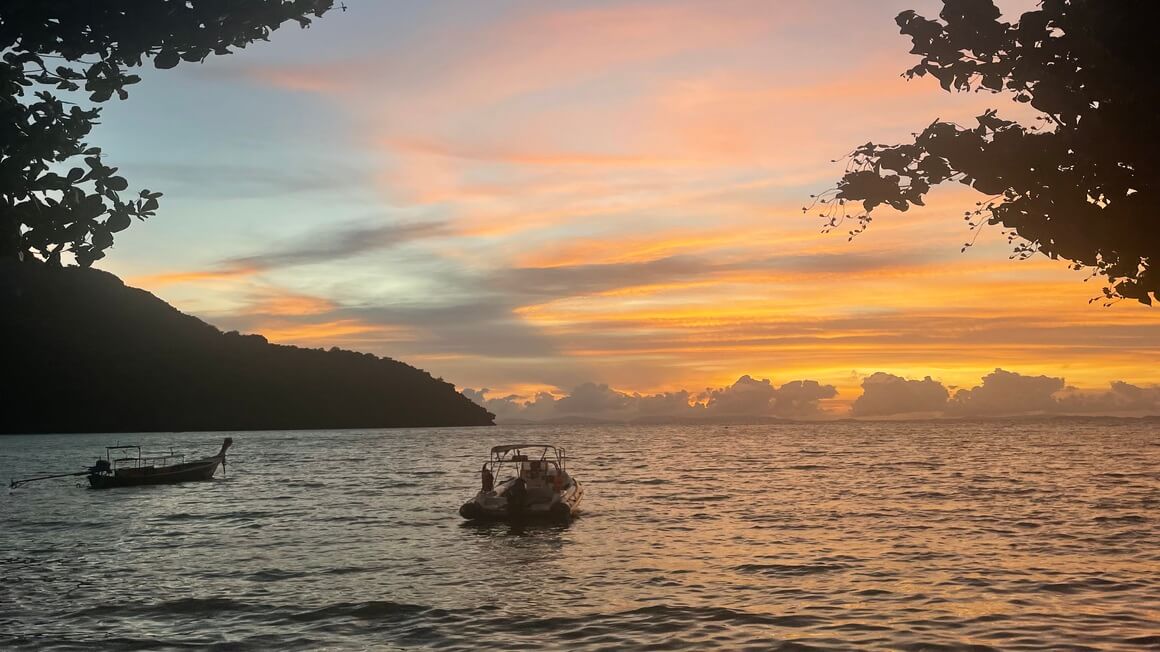 A sunset on the beach on Loh Dalum Beach, Phi Phi in Thailand