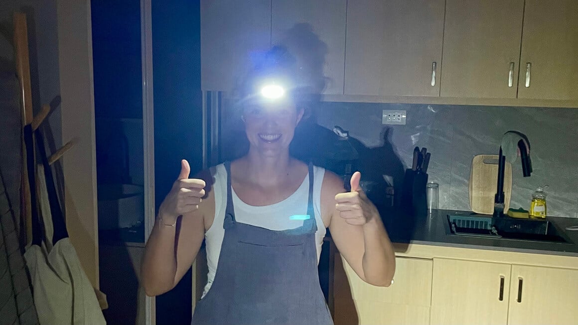 dani wearing a head torch in the Philippines during a power cut