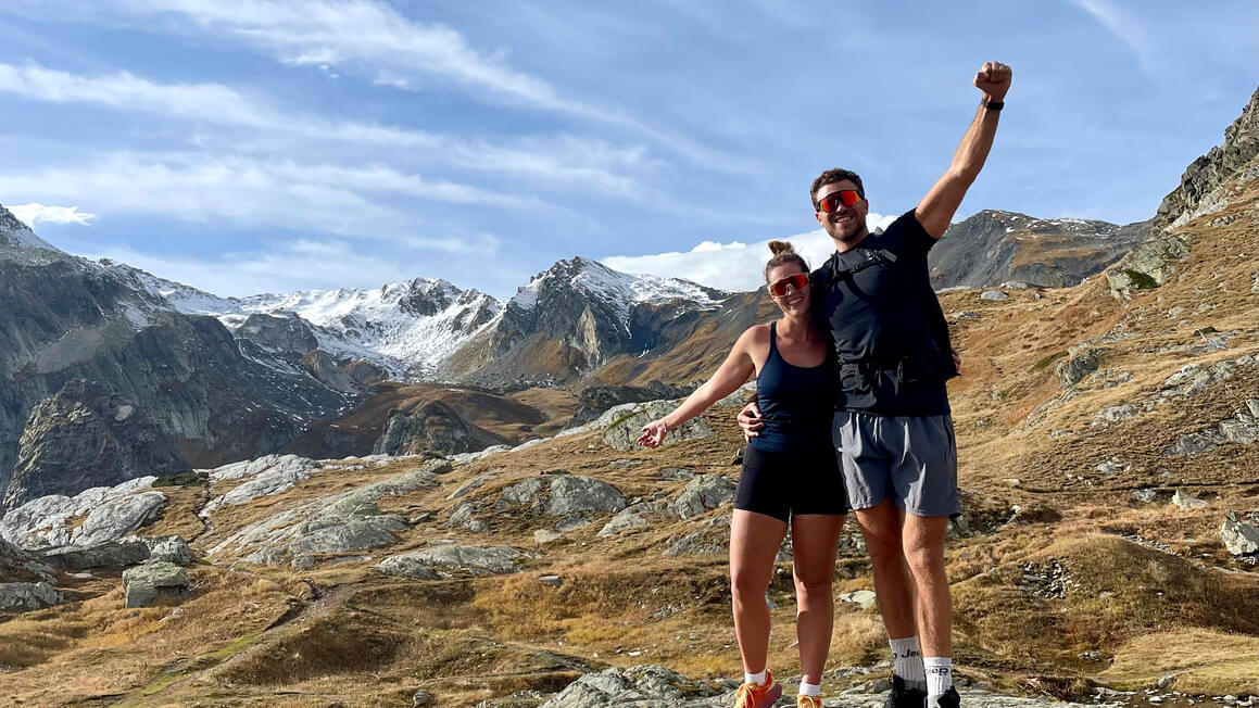 dani and harv hiking at the top of the mountains in Aosta Valley, Italy